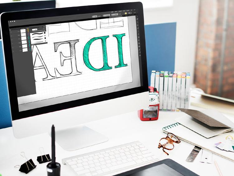 computer screen with a logo design